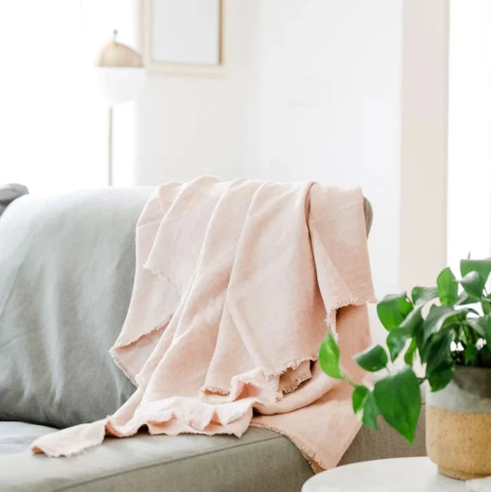 Pink stone washed linen blanket.