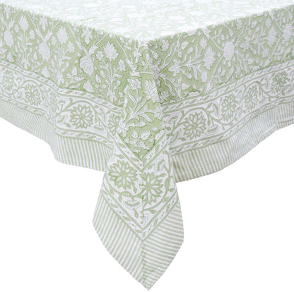 Green and white patterned tablecloth on a white background