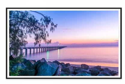 Long exposure of a dock at sunset with a colorful sky. Wall at print