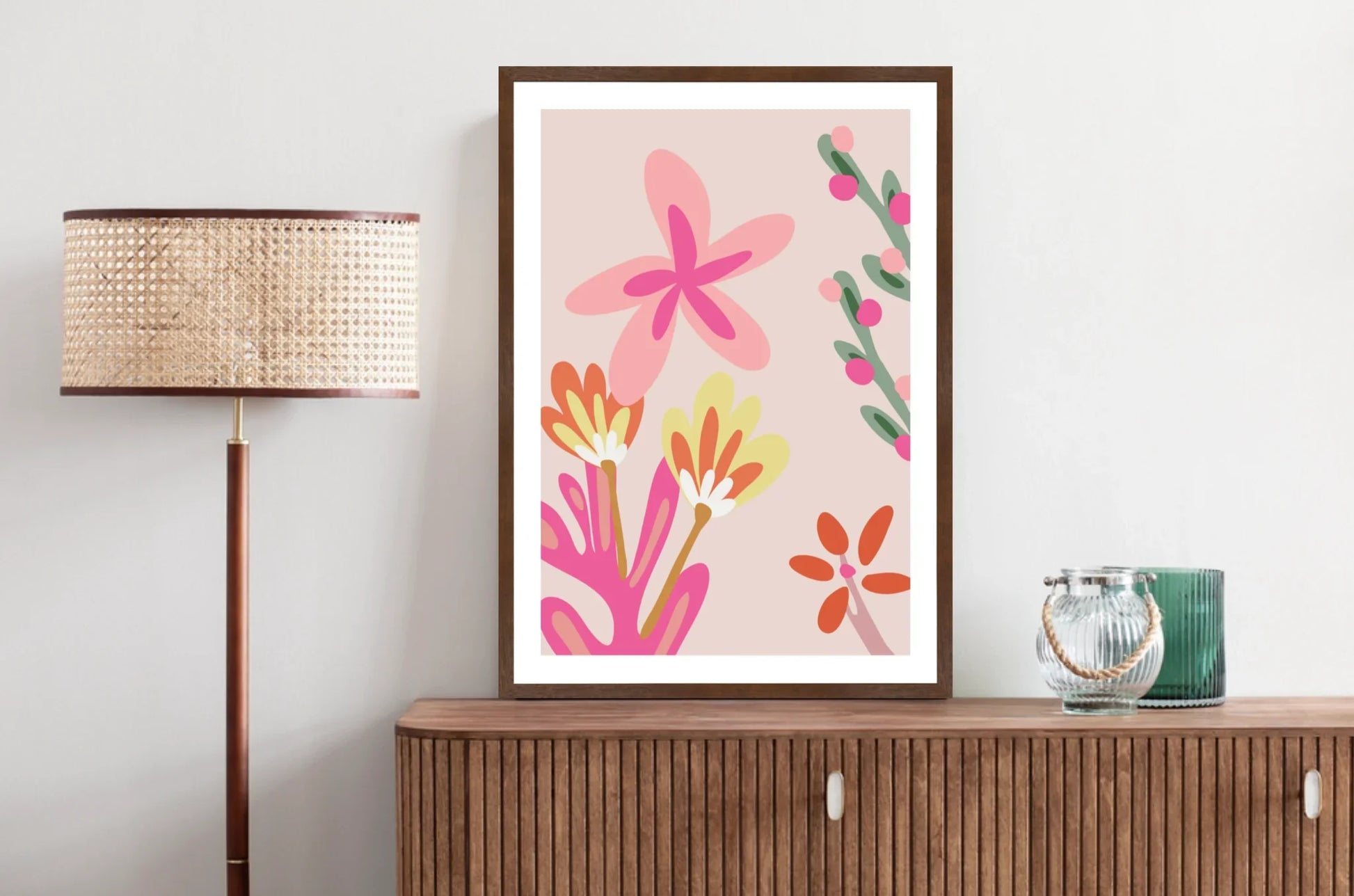 Framed pink floral abstract artwork.
