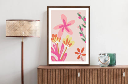 Framed pink floral abstract artwork.