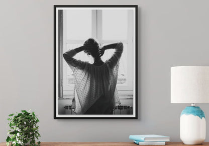  Black and White Fashion Wall Art Print of woman looking out window.