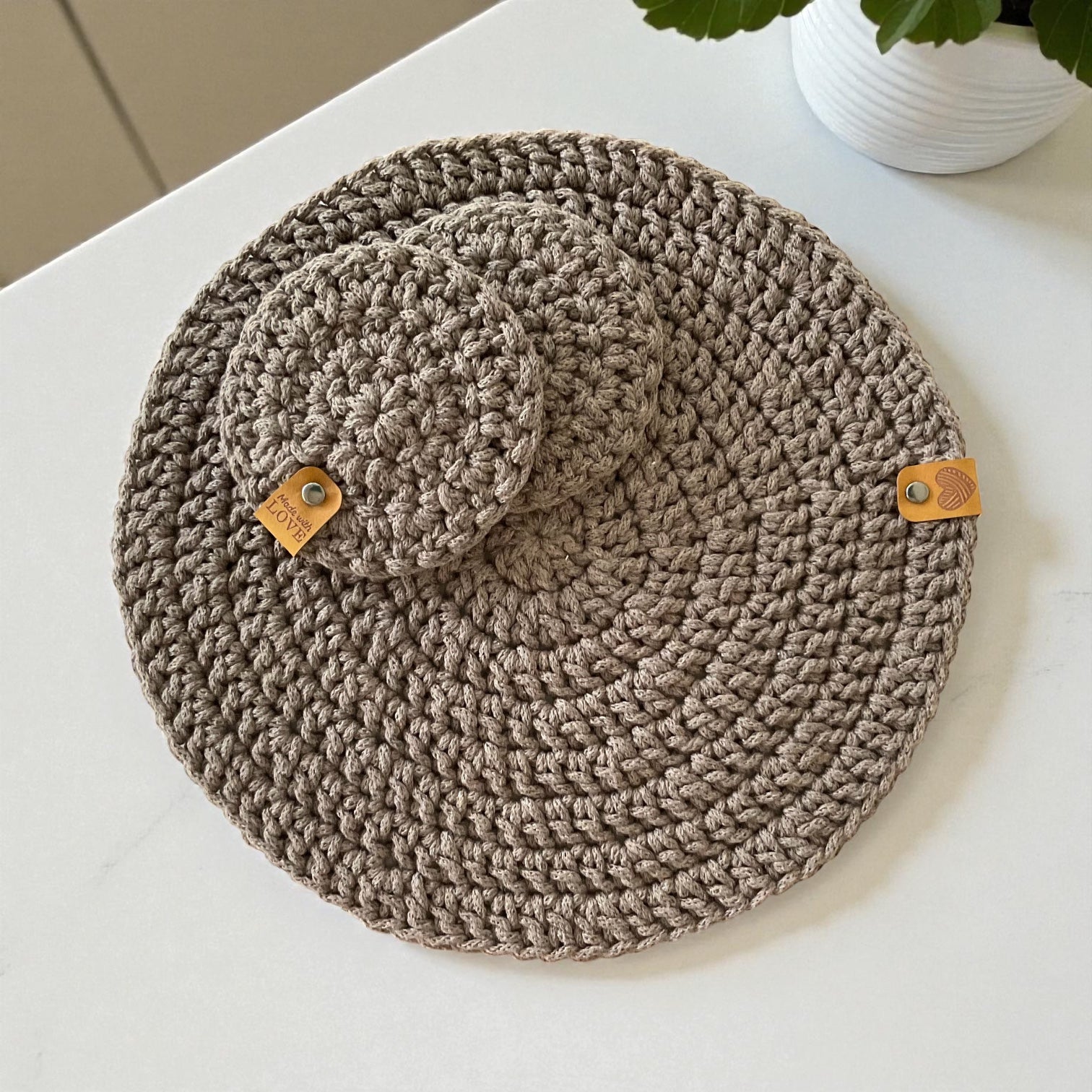 handmade crochet placemat and two coasters in brown taupe.