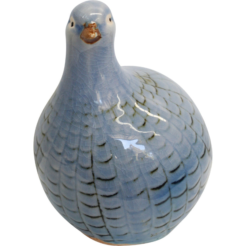Ceramic guinea fowl figurine with soft blue finish on a white background