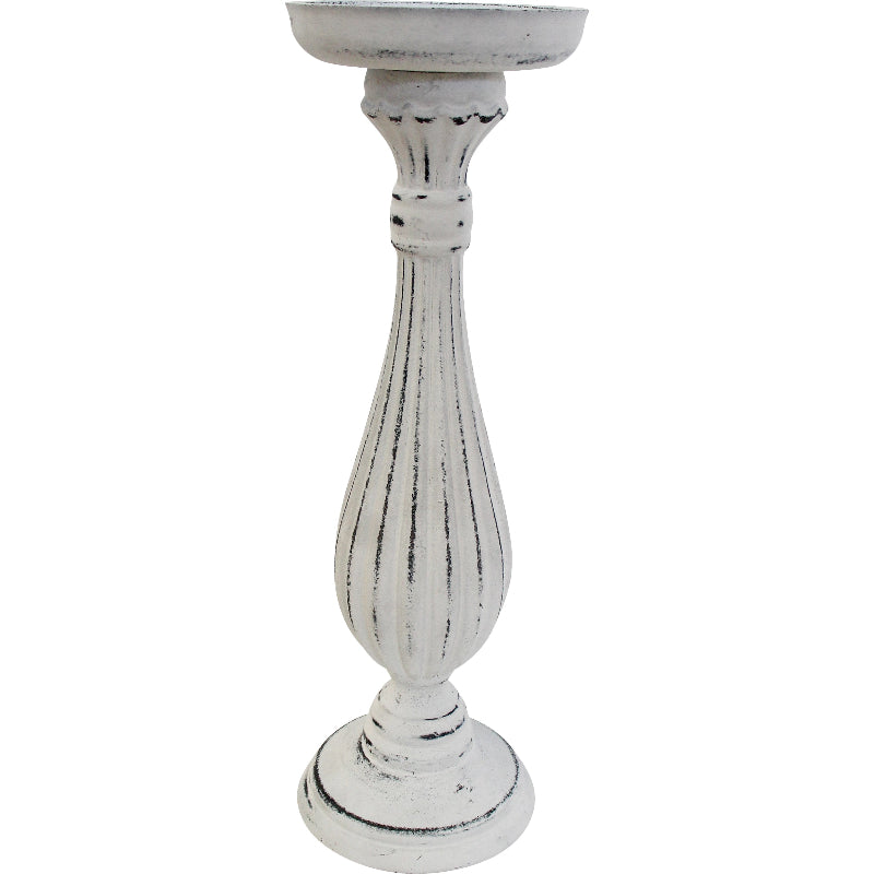 Decorative white wooden candle holder with ribbed design.